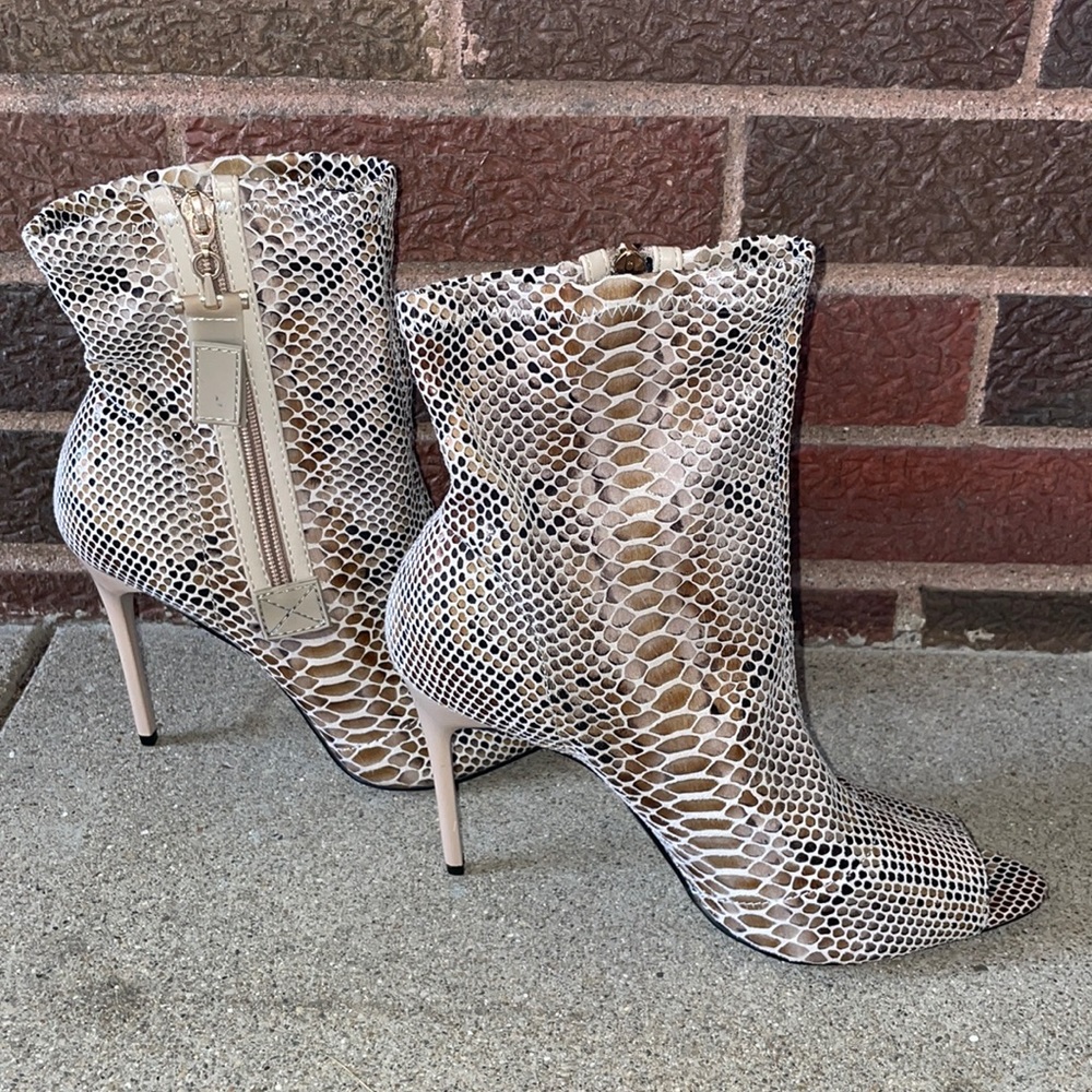 Peep toe booties, snake print